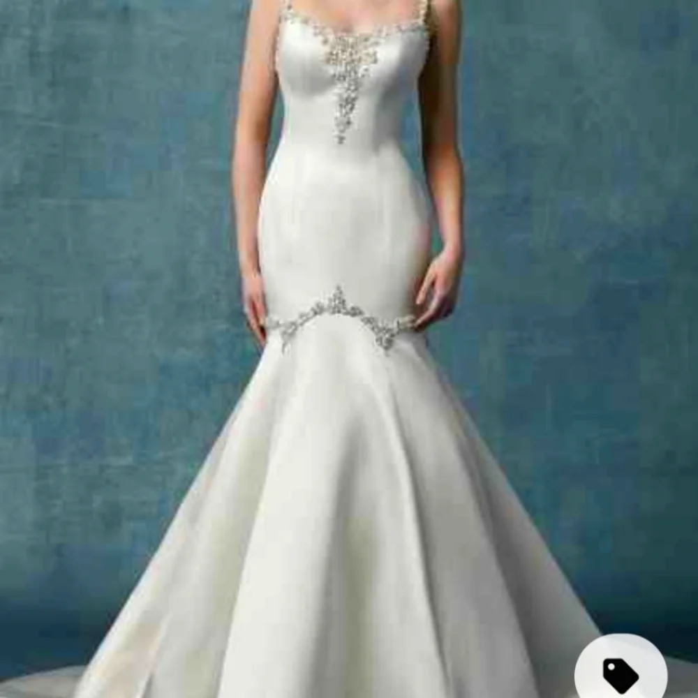 New Maggie Sottero Wedding Dress being stored at bridal store until sold - Picture 4 of 4